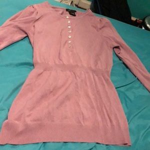 very flattering. on the tighter side. long sleeved